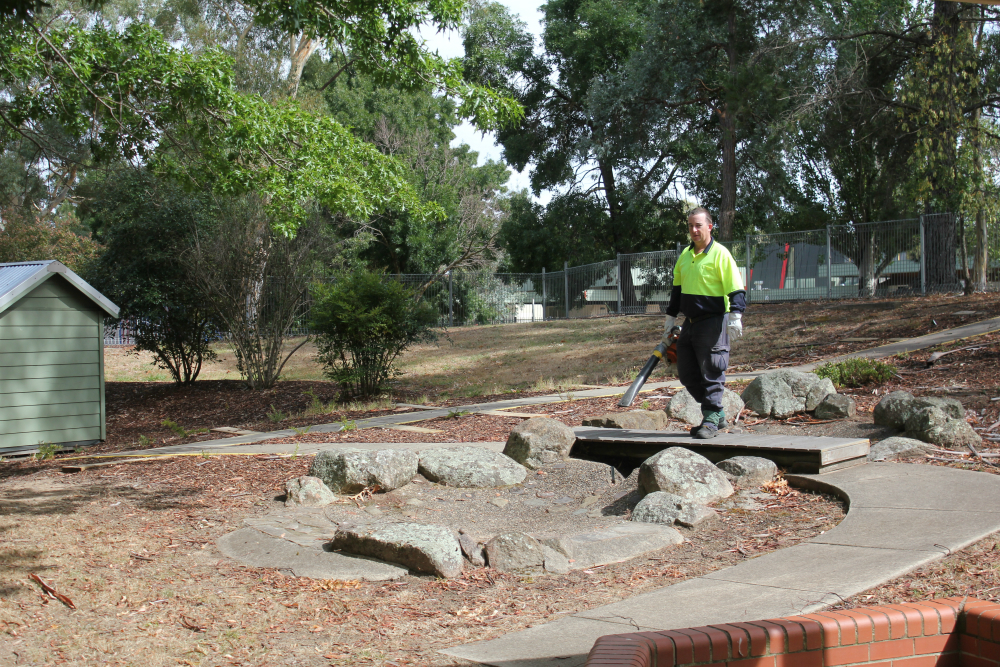 Our services: leaf blowing Koomarri's Garden Maintenance team